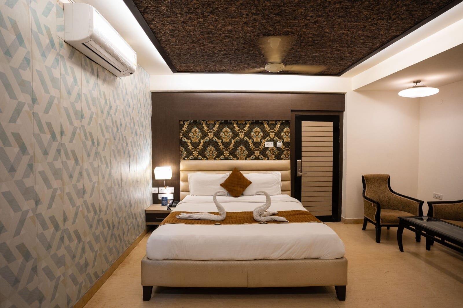Premium king room with designer ceiling and swan towel art